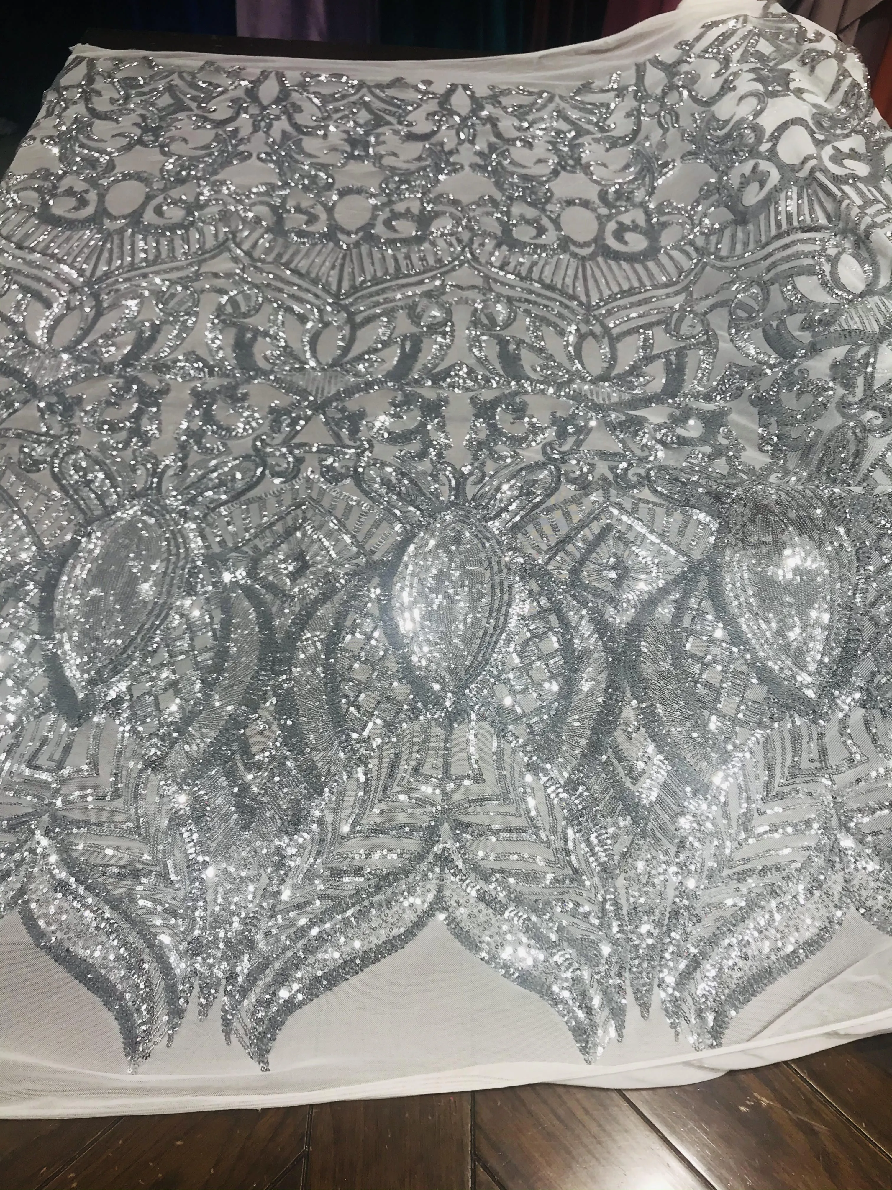 Royalty design embroidery with sequins on a 4 way stretch mesh-dresses-fashion-prom-nightgown-apparel-sold by the yard.